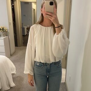 Women’s white flowy blouse